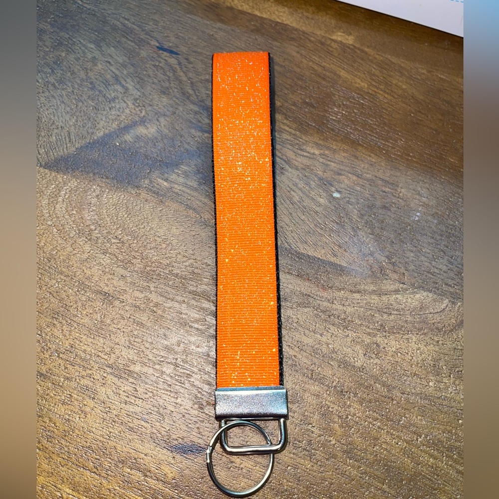 Orange and black shimmer key holder.